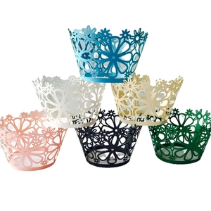 Laser cut floral cupcake wrappers in six colors for wedding and party decorations