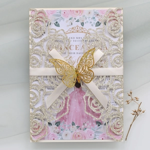 Detail of rose laser cut invitation with gold glitter, satin ribbon and 3D butterfly