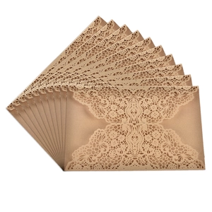 Set of 10 champagne gold laser-cut lace wedding invitations with floral butterfly patterns