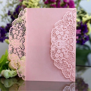 Pink laser-cut lace wedding invitation made of shimmering pearlescent paper for celebrations