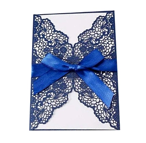 Navy blue laser cut hollow wedding invitation card with elegant royal blue ribbon bow