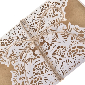 Laser cut lace wedding invitation with kraft paper and natural twine decorative ribbon
