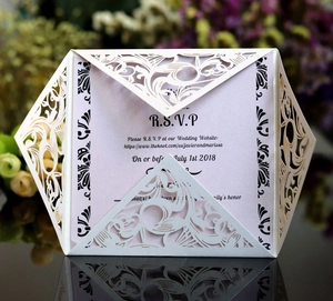 Laser cut white floral wedding invitation with soft pink RSVP card and pearlescent finish