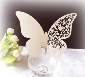 Elegant laser-cut butterfly cup card in cream white for wedding and party decorations
