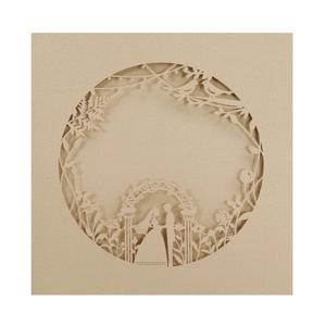 Elegant champagne gold laser-cut wedding invitation featuring romantic silhouette design