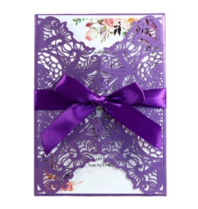 Elegant purple laser cut wedding invitation with ribbon and floral interior card
