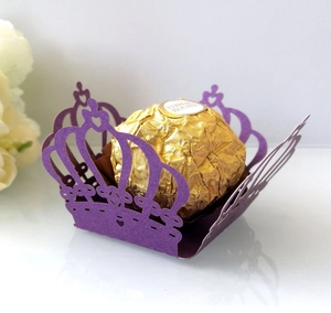 Laser cut crown shaped purple lace wrapper for chocolates with hollow heart design