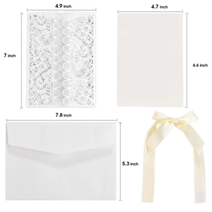 Laser cut white floral wedding invitation set with ribbon and size specifications