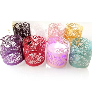 Laser cut leaf pattern paper candle wraps in multiple colors for festive LED decor