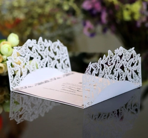 Elegant white laser-cut butterfly wedding invitation with high-quality pink inner card