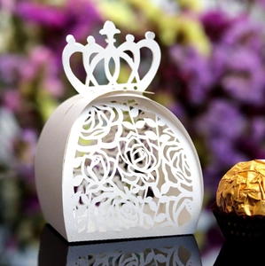 Laser-cut white crown favor box with hollow rose patterns for weddings and parties