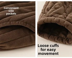 Detail view of brown corduroy trousers showing side pockets and quilted warm texture