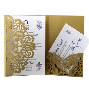 Golden laser-cut lace wedding invitation set with purple floral cards and elegant sleeve