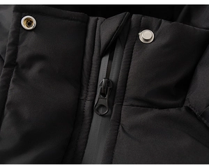 Close-up of waterproof zipper and metal buttons on children's black down jacket