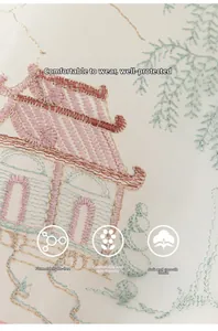 Detailed close-up of intricate Chinese traditional embroidery on soft kids' Hanfu fabric