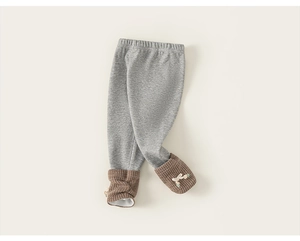 Detail showing the thick fleece lining and ribbed cuffs with cute 3D bunny ears for kids