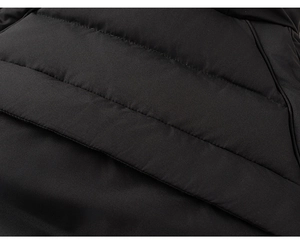 Detailed macro view of black waterproof quilted fabric with horizontal stitching