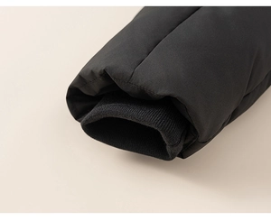 Close-up of black windproof down jacket sleeve with ribbed knit cuffs for thermal protection