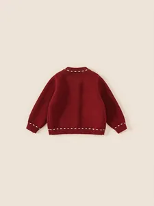 Festive burgundy knitted cardigan for girls with white embroidery and thick warm texture