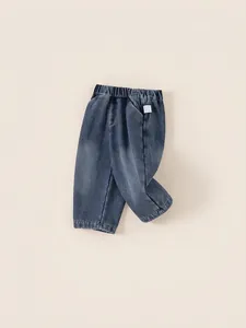 Kids warm dark blue denim pants with elastic waist and soft inner fleece lining