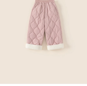 Detail of pink quilted girls winter trousers with warm sherpa fleece lining hem