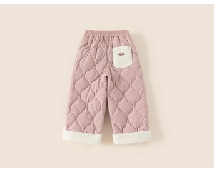 Detailed view of pink quilted kids' pants with white fleece pocket and dog embroidery