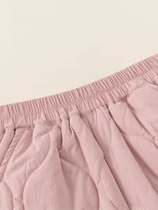 Quilted light pink winter pants for girls with elastic waist and thermal padding