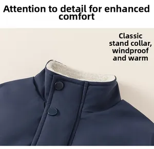 Detail of blue boys jacket with warm white fleece lining and buttoned stand collar