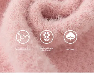 Close-up of soft pink faux fur sweater fabric showing fluffy texture and premium softness