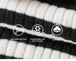 Close-up of soft ribbed knit cotton fabric with black and white stripes for kids socks