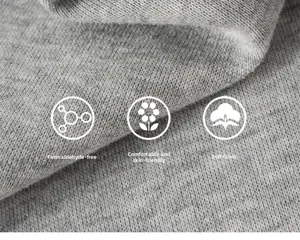 Détail macro du tissu polaire gris doux et doux pour la peau avec texture et fibres
