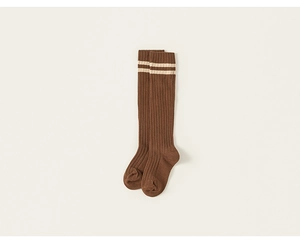 Detailed view of dark brown ribbed knee-high socks with classic beige double stripes