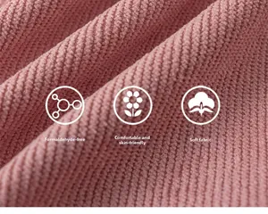 Detailed macro view of pink ribbed knit fabric, soft skin-friendly texture for kids