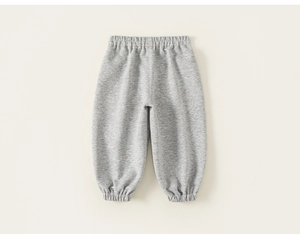Vue détaillée du pantalon de jogging gris chiné pour enfant avec taille élastique