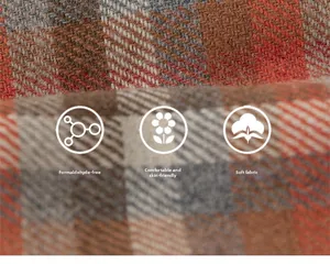 Close-up of soft plaid fabric texture showing skin-friendly and formaldehyde-free quality