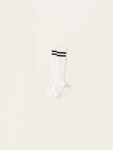 White ribbed cotton calf socks with black varsity stripes and academic style design