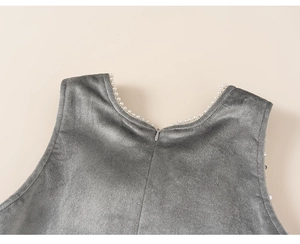 Detail of grey velvet dress collar with faux pearl beads and invisible zipper back
