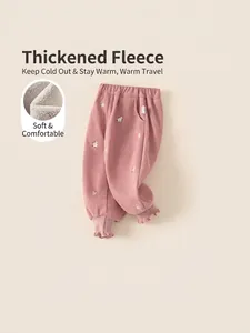Girls warm thermal pants with vertical stripes, pink floral embroidery and ruffle cuffs