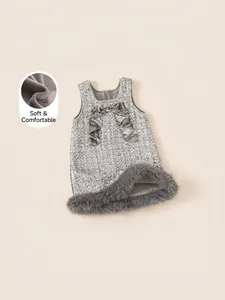 Winter grey sequin dress for girls with bow detail and soft faux fur trim