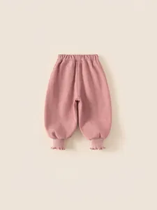 Pink knit toddler girl jogger pants with ruffle cuffs and cozy elastic waist for winter