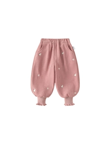 Pink ribbed toddler girls trousers with floral embroidery and ruffled elastic ankle cuffs