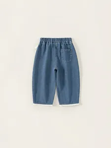 Jeans dritti da bambina in denim blu con bordo in pizzo e vita elasticizzata