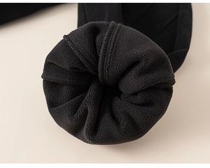 Detail of boys winter joggers featuring thick black fleece lining and ribbed ankle cuffs