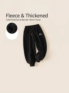 Boys winter thick fleece sweatpants in black with embroidered slogan and drawstring