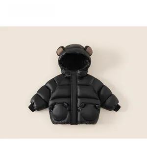 Detail of glossy black toddler hooded jacket with cute brown bear ears on the hood