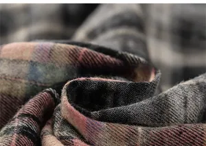 Macro shot of soft pink and grey checkered fabric texture for boys flannel shirt