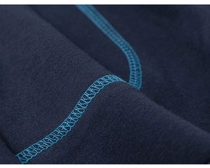 Detailed close-up showing high-quality bright blue reinforced stitching on navy knit fabric