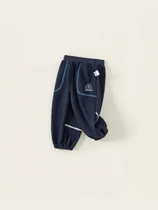 Dark blue kids joggers with elastic waist and reflective stripes for active boys