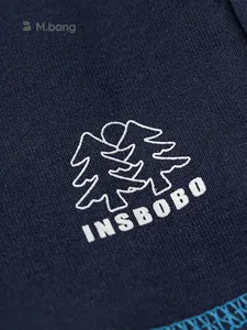 Kids navy blue casual jogger pants with white INSBOBO embroidery and soft knit texture