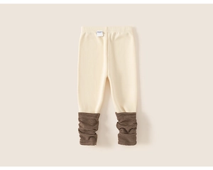 Detail of toddler thermal leggings featuring fleece lining and striped socks effect cuffs